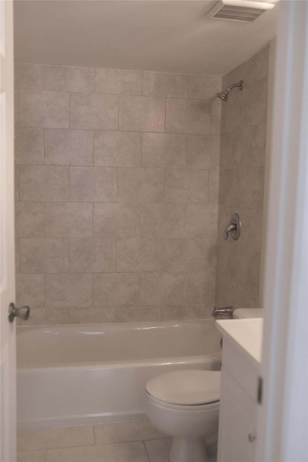 231 Southwest 113th Way, Unit 231 Pembroke Pines, FL 33025 - Photo 13 of 26 a bathroom with a shower and a toilet