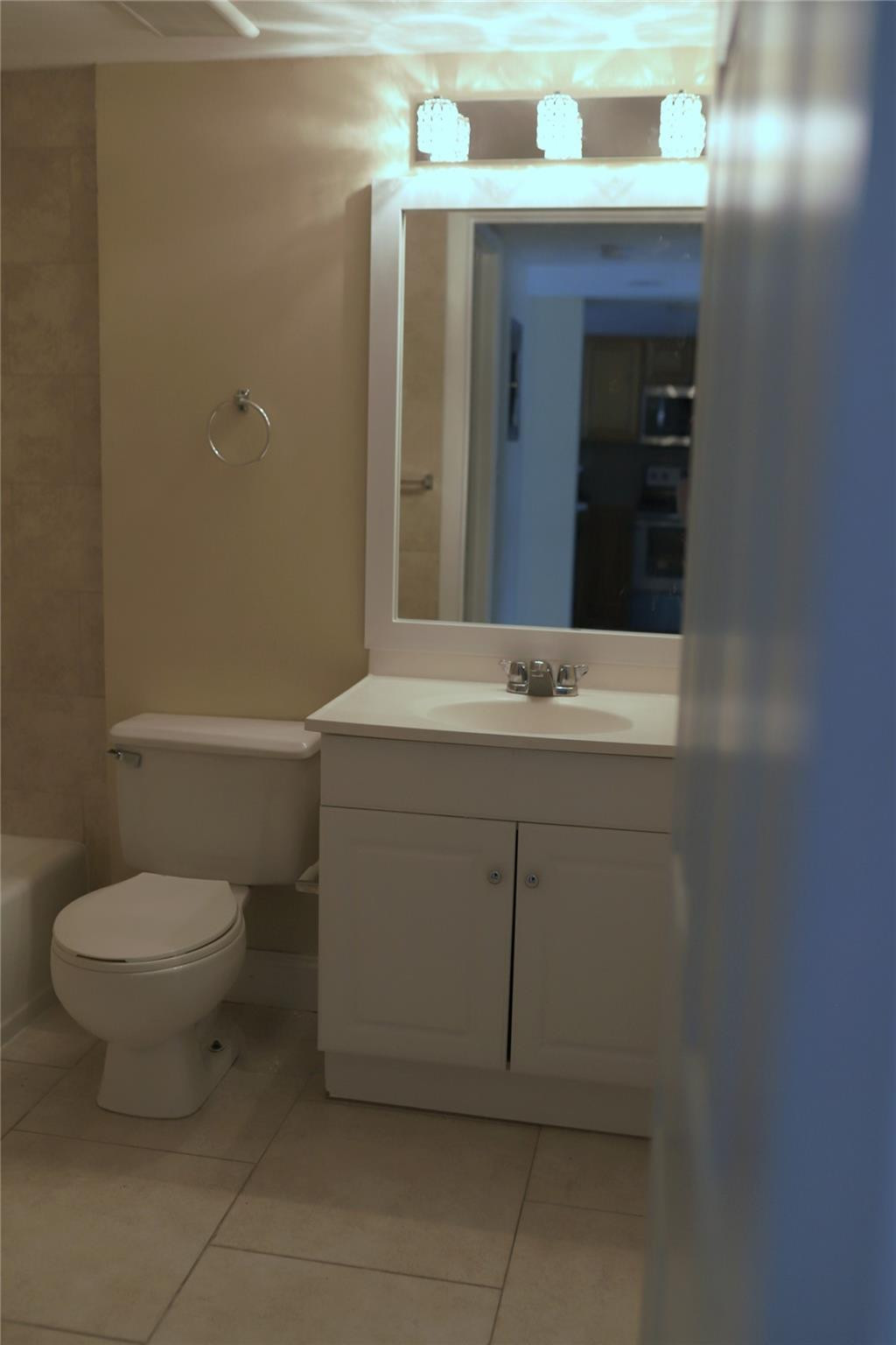231 Southwest 113th Way, Unit 231 Pembroke Pines, FL 33025 - Photo 14 of 26 a bathroom with a sink toilet and mirror