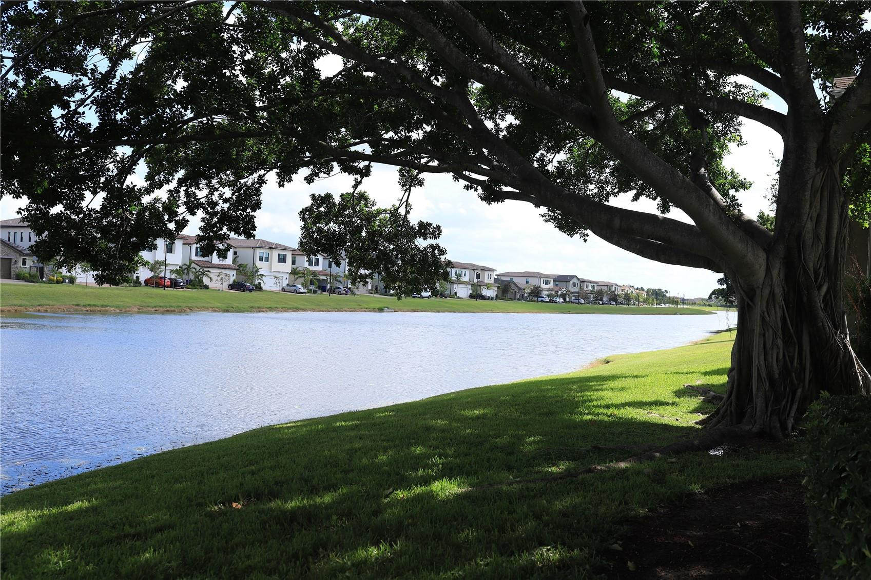 231 Southwest 113th Way, Unit 231 Pembroke Pines, FL 33025 - Photo 18 of 26 a view of a golf course with a lake view