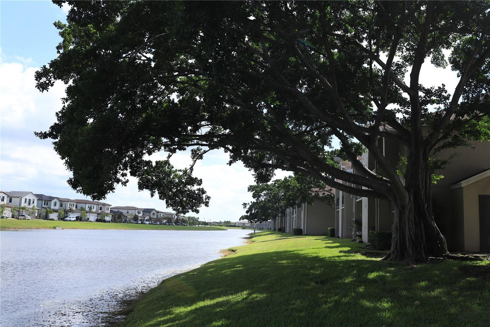 231 Southwest 113th Way, Unit 231 Pembroke Pines, FL 33025 - Photo 21 of 26 a view of an outdoor space and yard