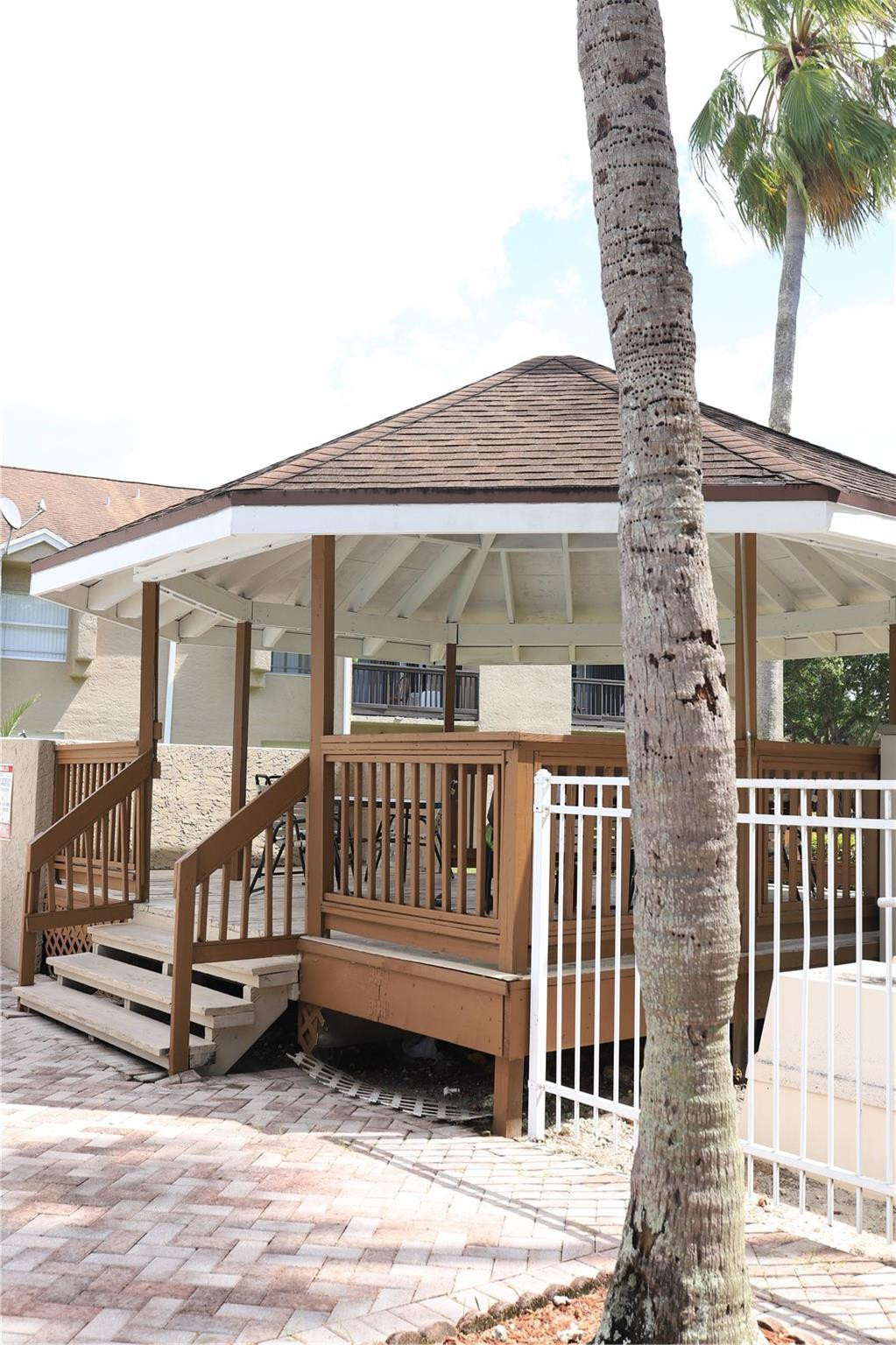 231 Southwest 113th Way, Unit 231 Pembroke Pines, FL 33025 - Photo 23 of 26 a view of a house with a wooden deck