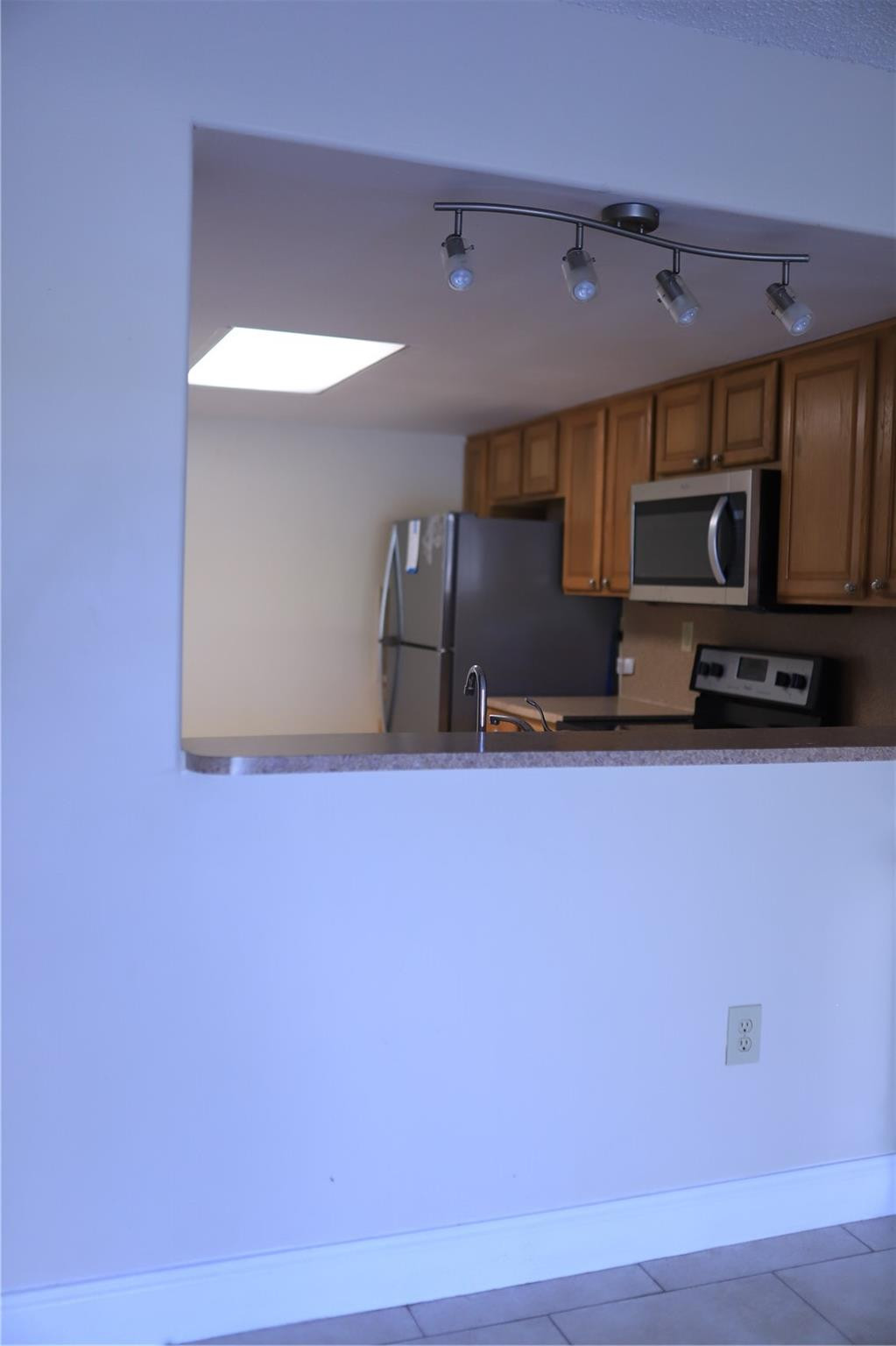 231 Southwest 113th Way, Unit 231 Pembroke Pines, FL 33025 - Photo 9 of 26 a front view of a house