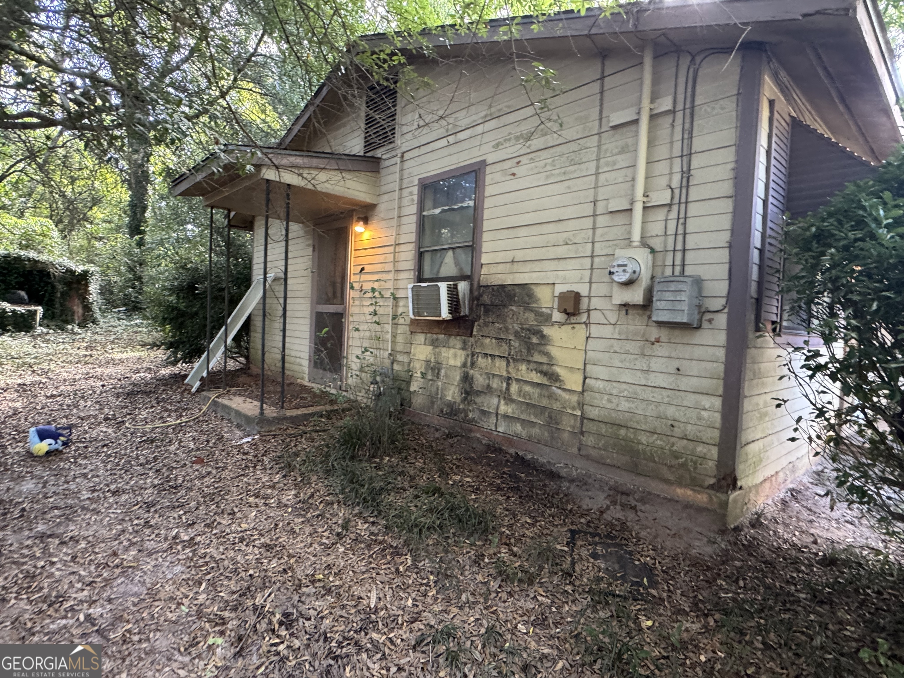 406 South Hampton Street Americus, GA 31709 - Photo 2 of 9 a view of a house with a yard