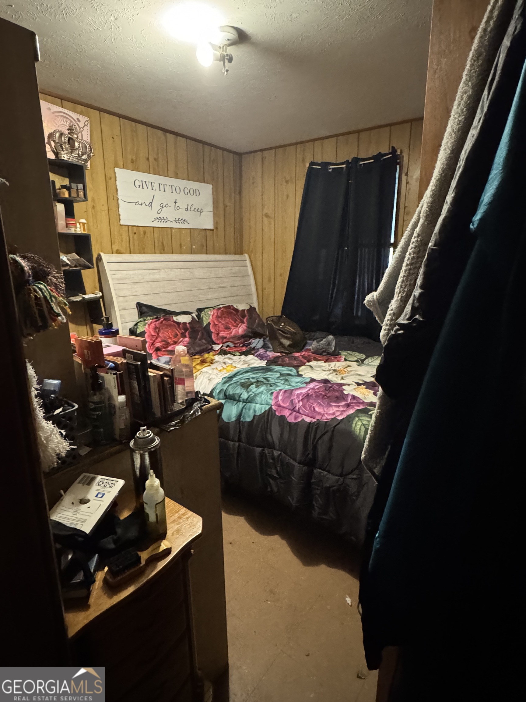 406 South Hampton Street Americus, GA 31709 - Photo 6 of 9 a room with lots of storage and utility