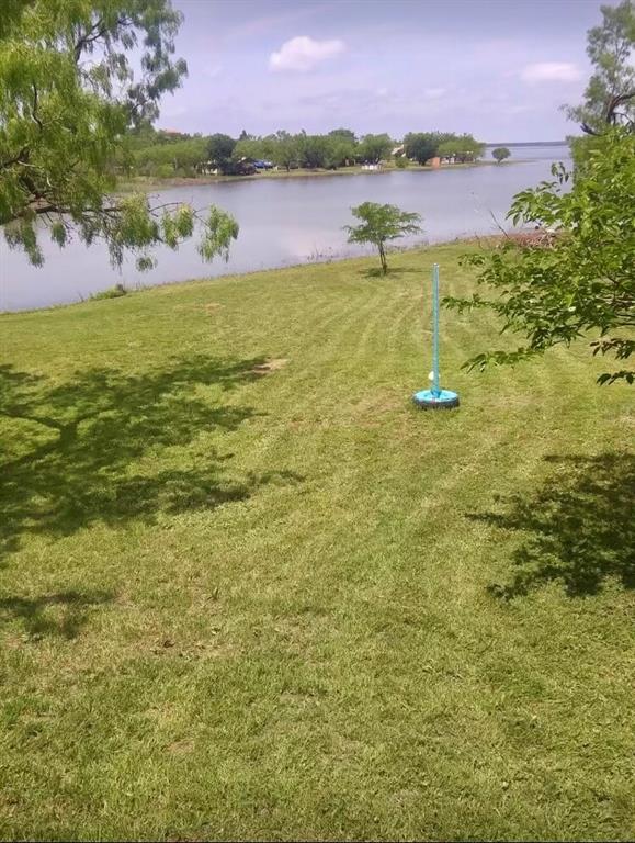 4942 County Road 206 Breckenridge, TX 76424 - Photo 12 of 40 a view of a lake with a mountain