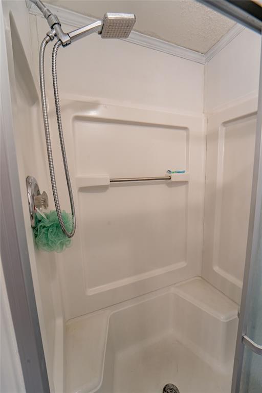 4942 County Road 206 Breckenridge, TX 76424 - Photo 27 of 40 a bathroom with a shower