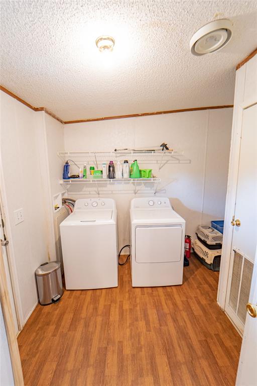 4942 County Road 206 Breckenridge, TX 76424 - Photo 31 of 40 a utility room with sink dryer and washer