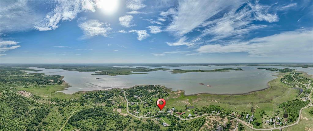 4942 County Road 206 Breckenridge, TX 76424 - Photo 4 of 40 a view of a lake from a yard