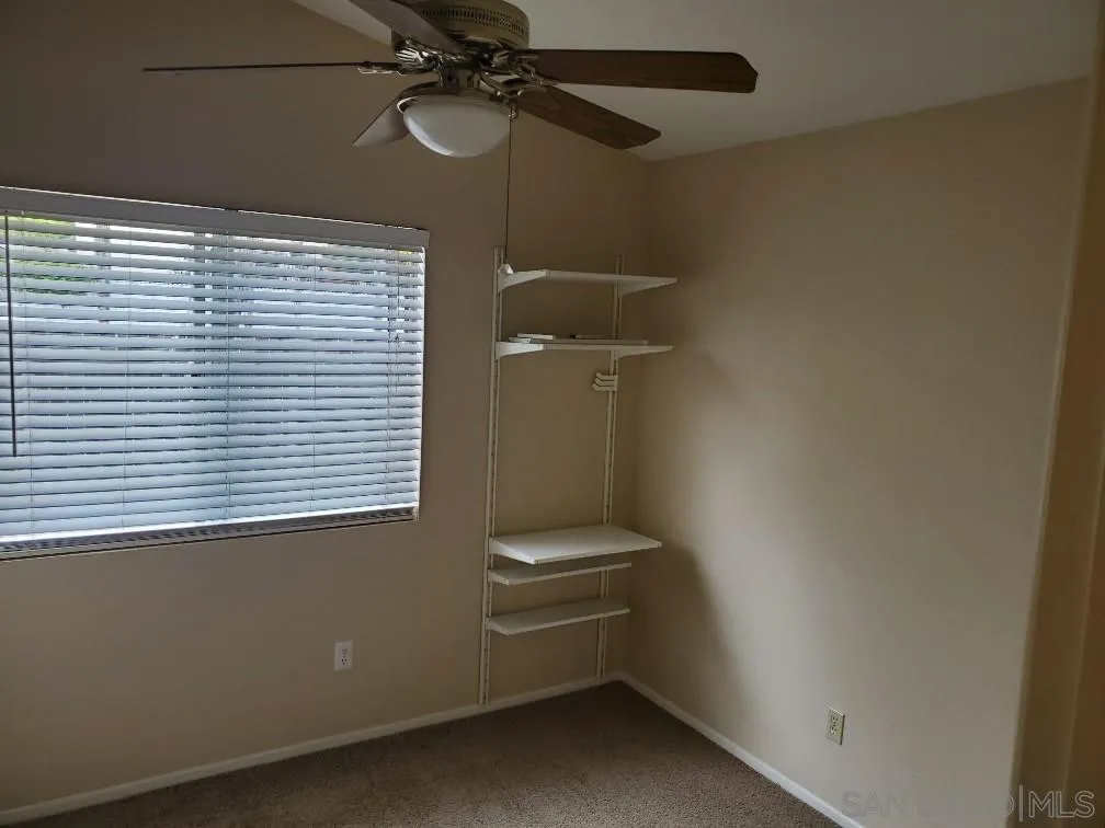 2708 Wind River Road El Cajon, CA 92019 - Photo 14 of 20 a room with a window and a fan