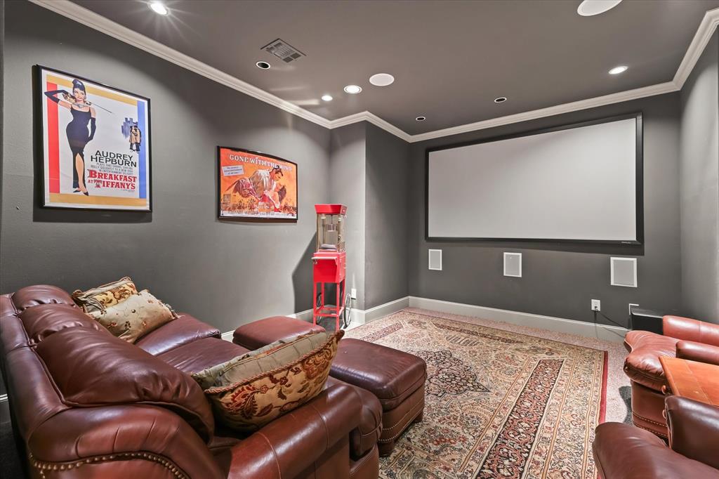 2021 Kings Pass Heath, TX 75032 - Photo 23 of 37 a bedroom with furniture and a flat screen tv