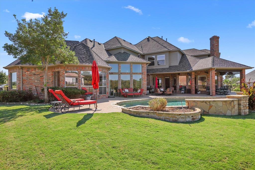 2021 Kings Pass Heath, TX 75032 - Photo 29 of 37 a building outdoor space with patio furniture and white walls