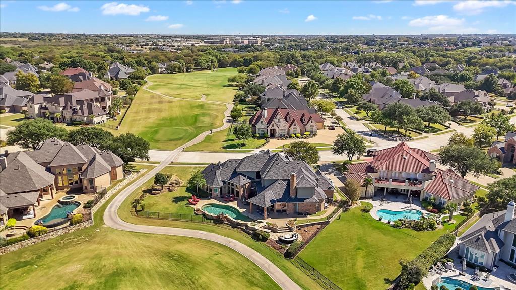 2021 Kings Pass Heath, TX 75032 - Photo 32 of 37 an aerial view of residential houses with outdoor space
