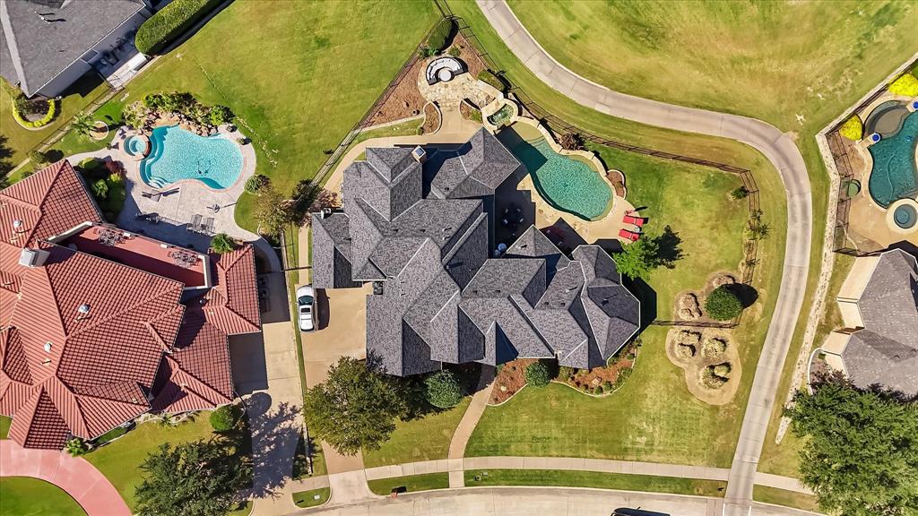 2021 Kings Pass Heath, TX 75032 - Photo 37 of 37 an aerial view of a house with a swimming pool