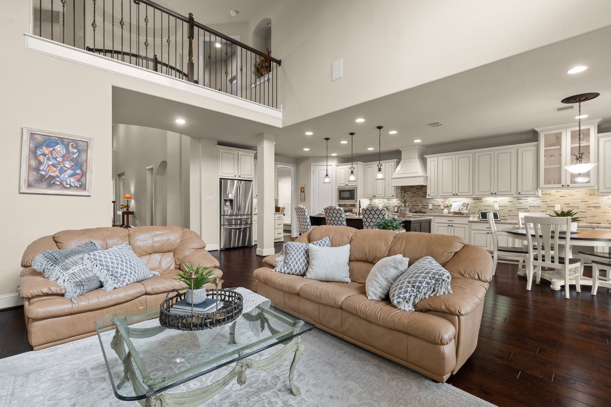 107 Elk Run Court Conroe, TX 77384 - Photo 17 of 50 Spacious open-concept living and dining area, perfect for entertaining.