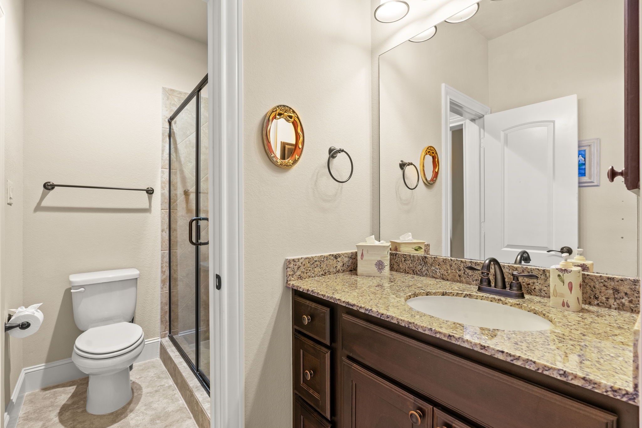 107 Elk Run Court Conroe, TX 77384 - Photo 38 of 50 Jack and Jill bathroom upstairs