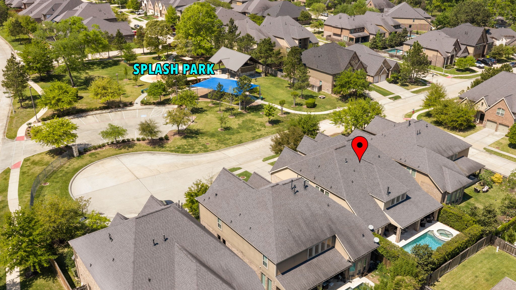107 Elk Run Court Conroe, TX 77384 - Photo 43 of 50 Ideal location across from community splash pad and park