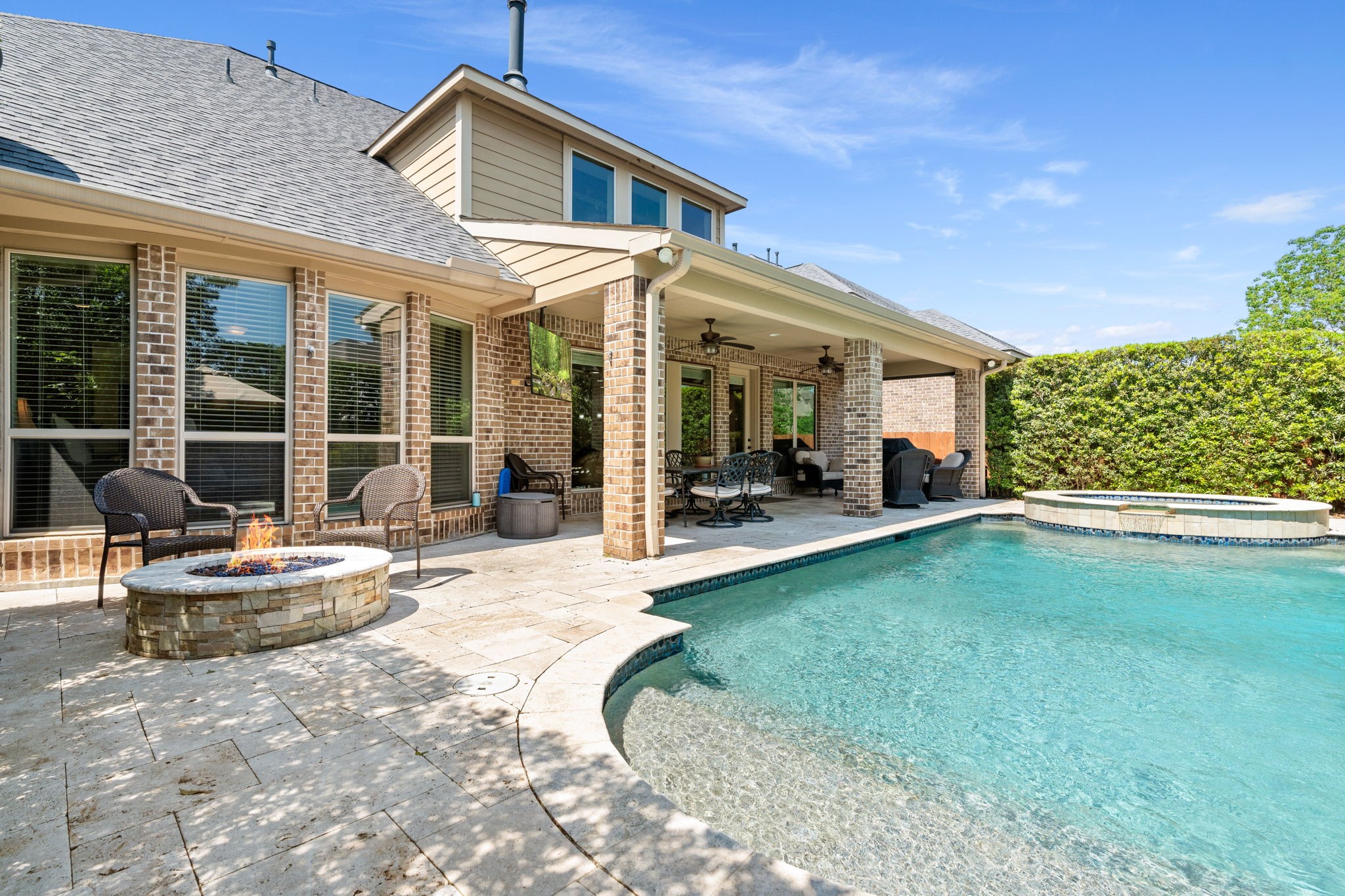 107 Elk Run Court Conroe, TX 77384 - Photo 6 of 50 Fire pit area, ideal for outdoor entertainment and relaxation.