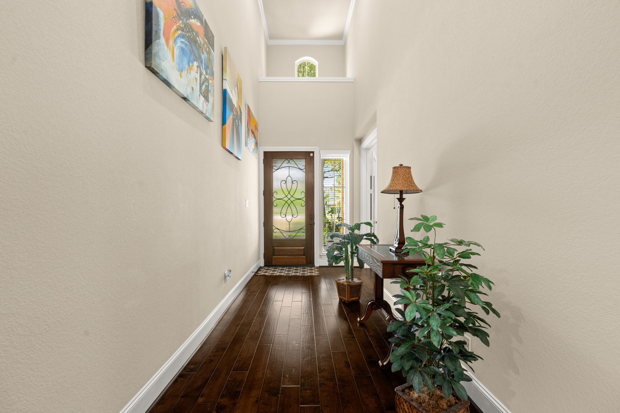107 Elk Run Court Conroe, TX 77384 - Photo 8 of 50 Welcome home to a grand formal entryway with soaring ceilings, offering an inviting and spacious first impression.