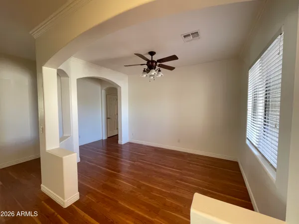 a view of livingroom with hardwood floor and hallway