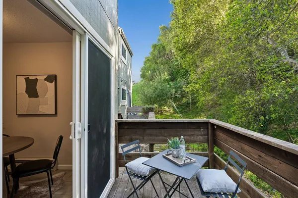 a view of balcony with furniture and outdoor space