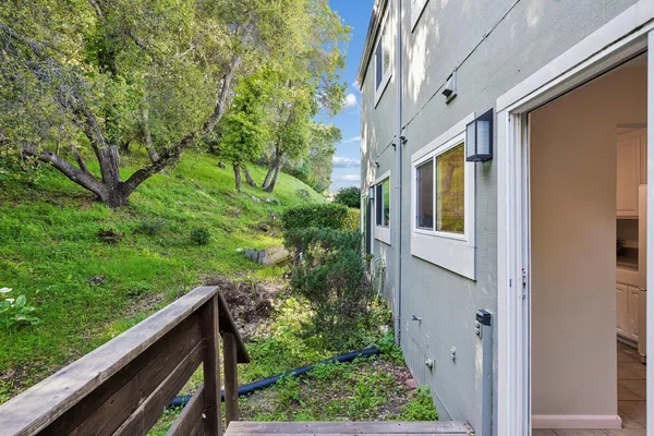 a view of a balcony with an outdoor space
