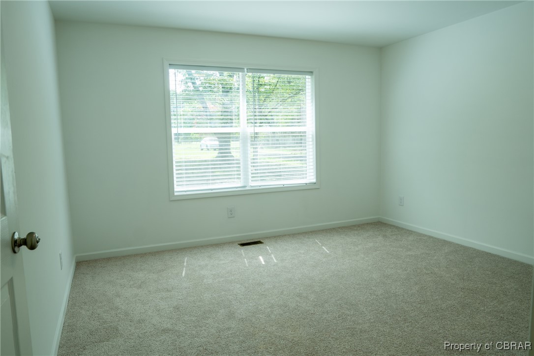 5726 Clay Bank Road Gloucester, VA 23061 - Photo 4 of 40 View of carpeted spare room