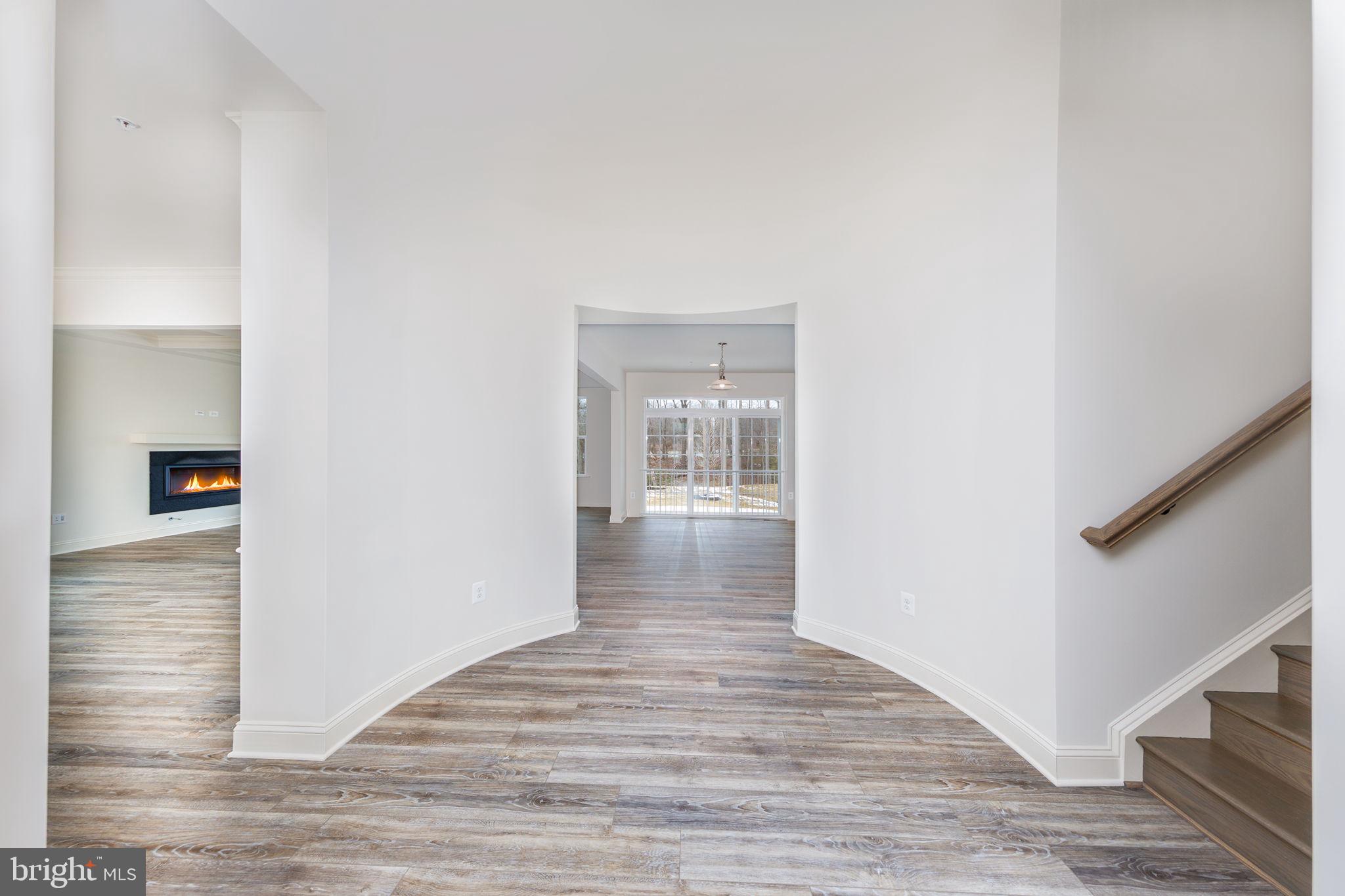 15719 Henrietta Drive Accokeek, MD 20607 - Photo 12 of 48 a view of hallway with wooden floor
