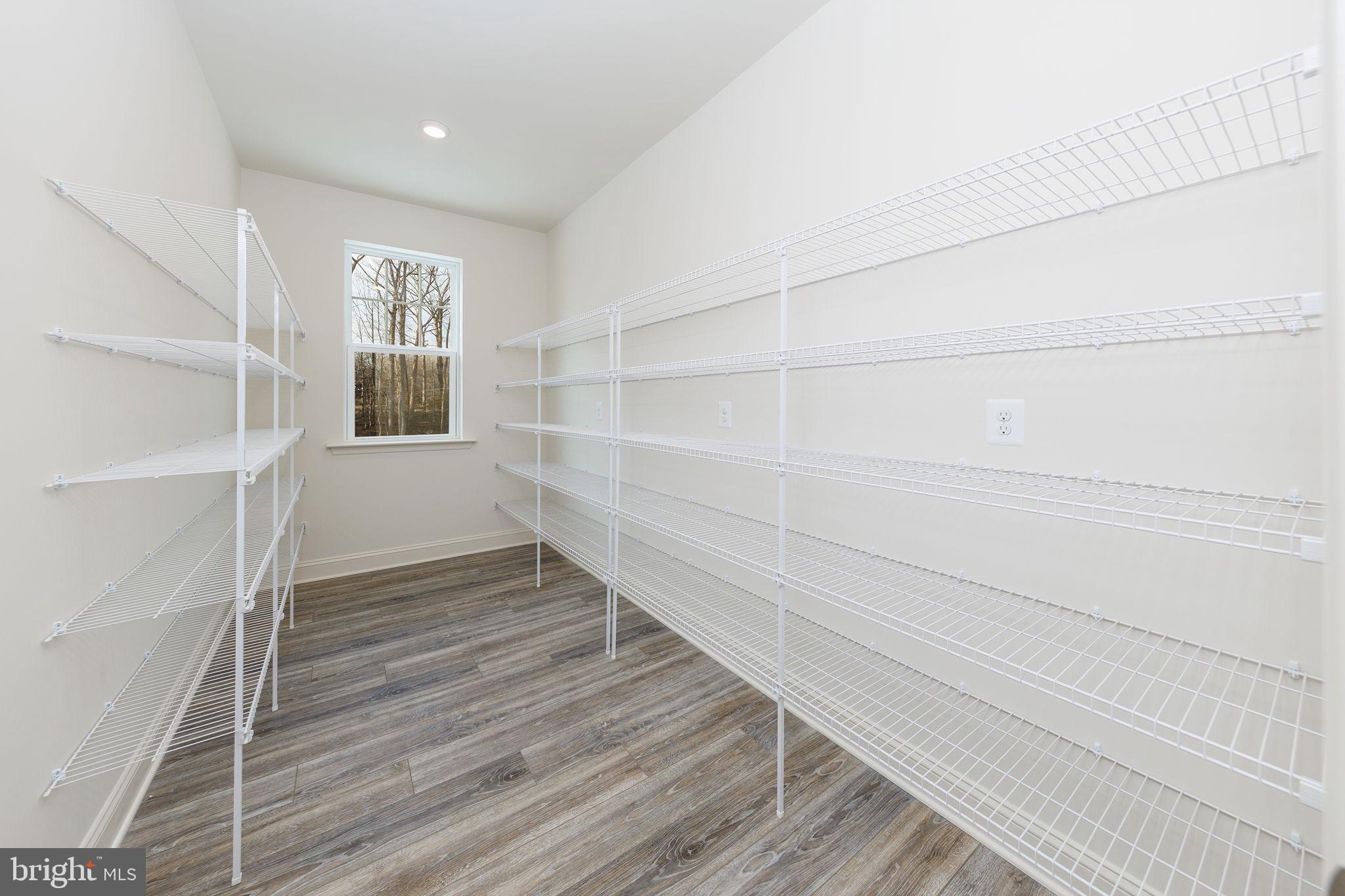 15719 Henrietta Drive Accokeek, MD 20607 - Photo 16 of 48 a view of an empty walk in closet
