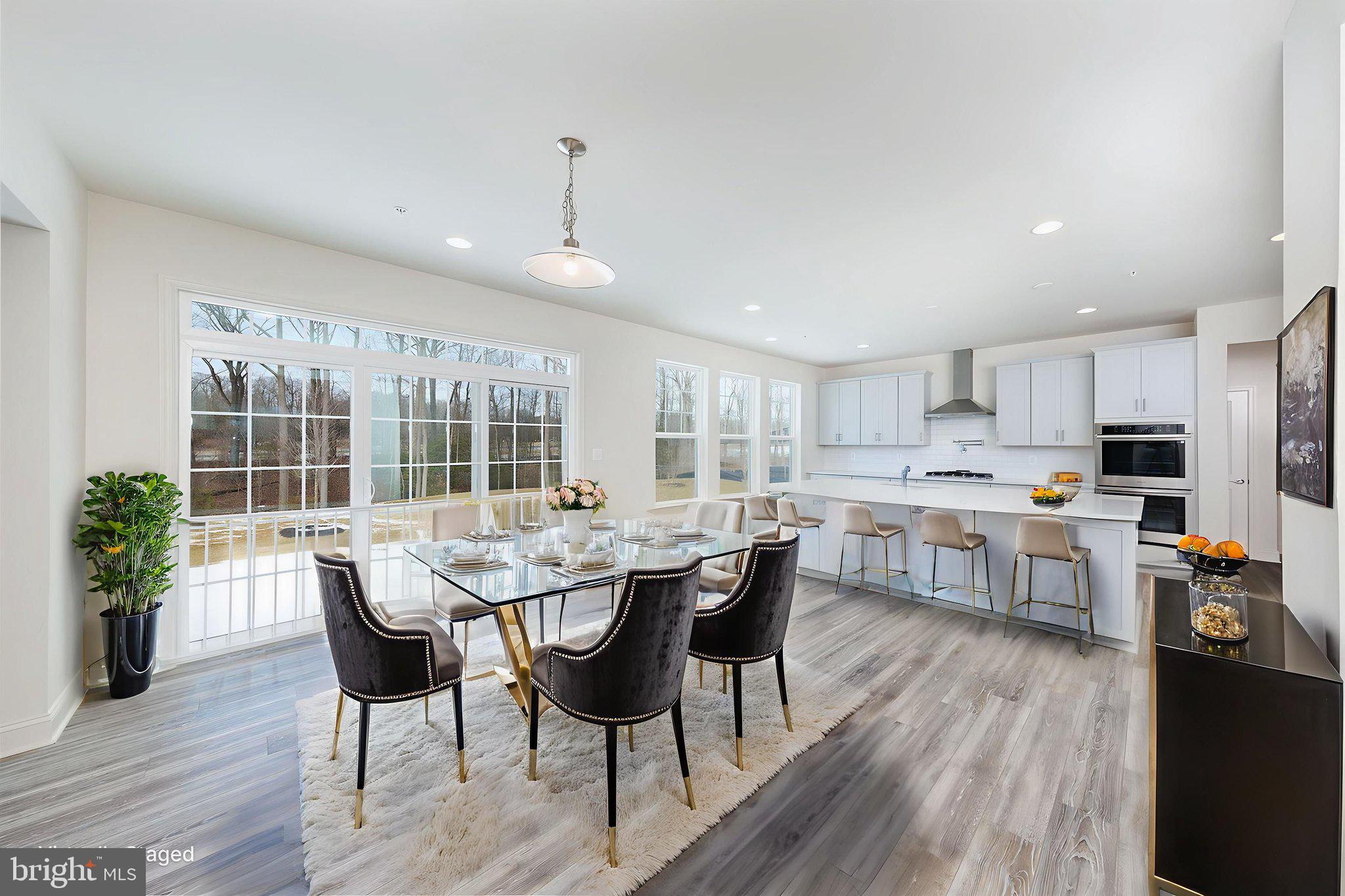 15719 Henrietta Drive Accokeek, MD 20607 - Photo 33 of 48 a view of a dining room with furniture and wooden floor