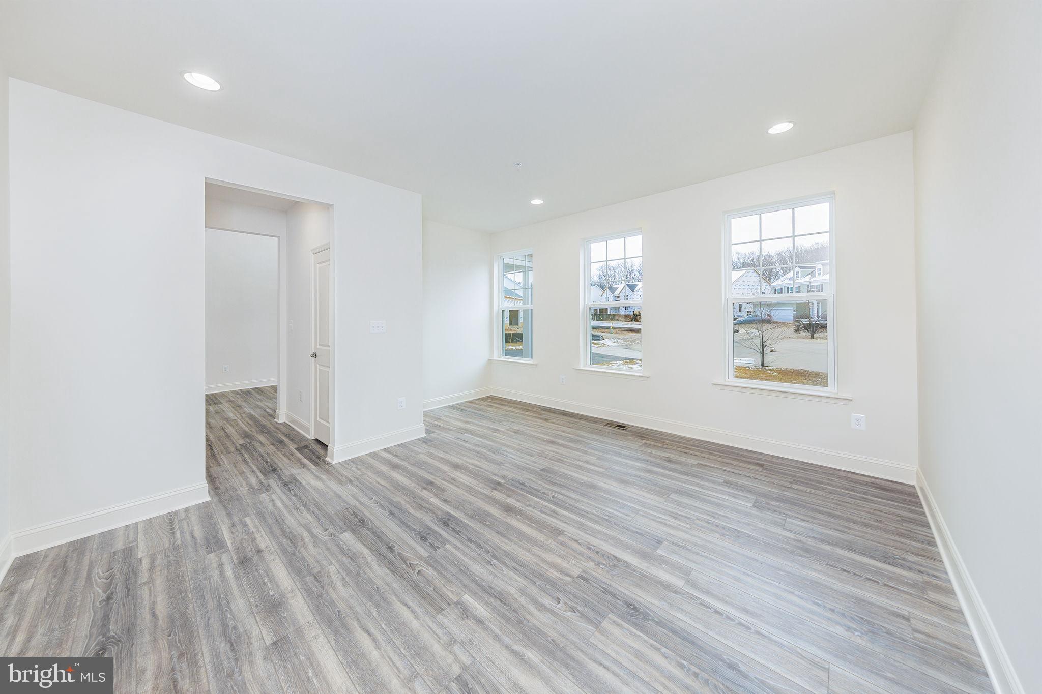 15719 Henrietta Drive Accokeek, MD 20607 - Photo 37 of 48 wooden floor in an empty room with a window