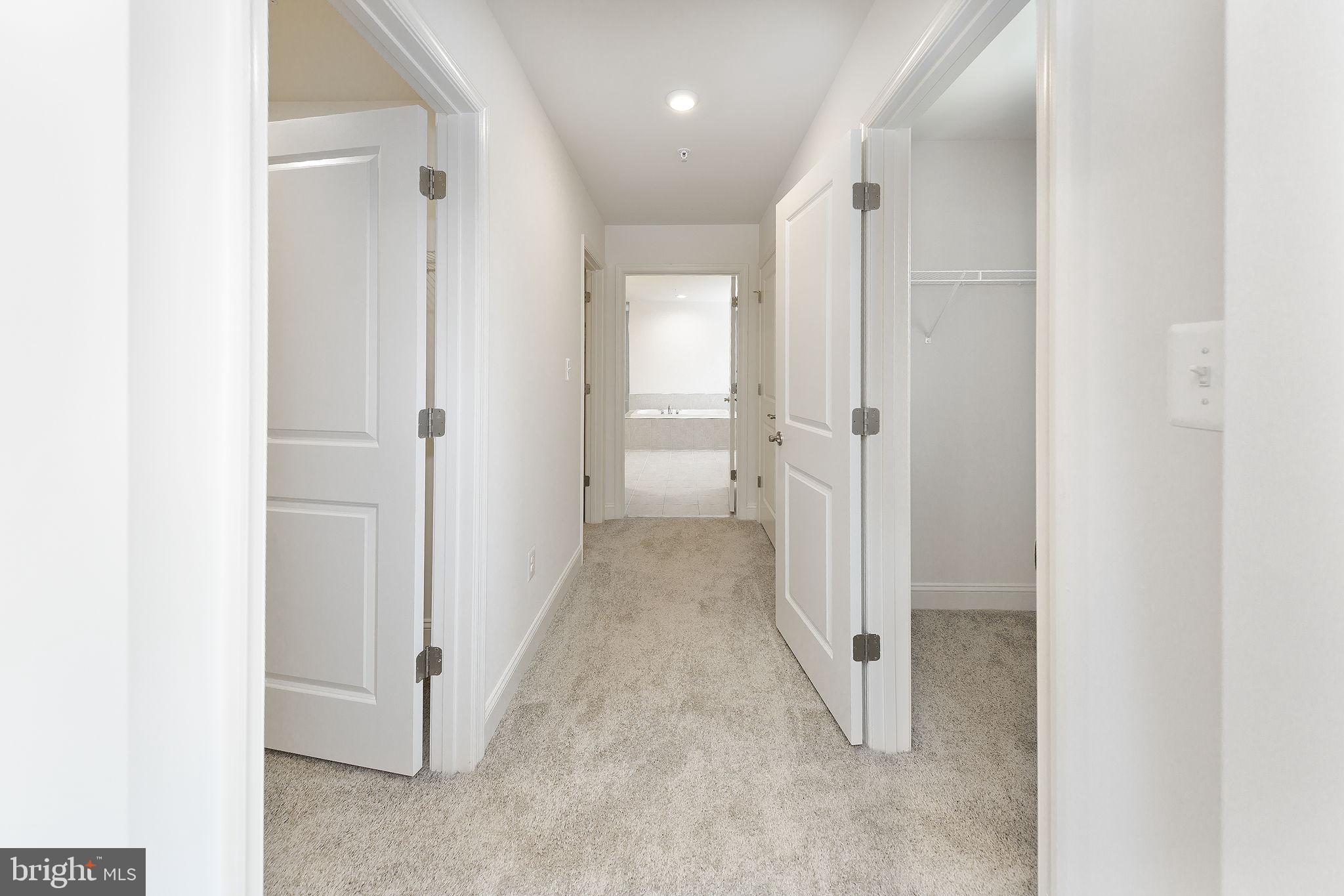 15719 Henrietta Drive Accokeek, MD 20607 - Photo 40 of 48 a view of a hallway with white walls