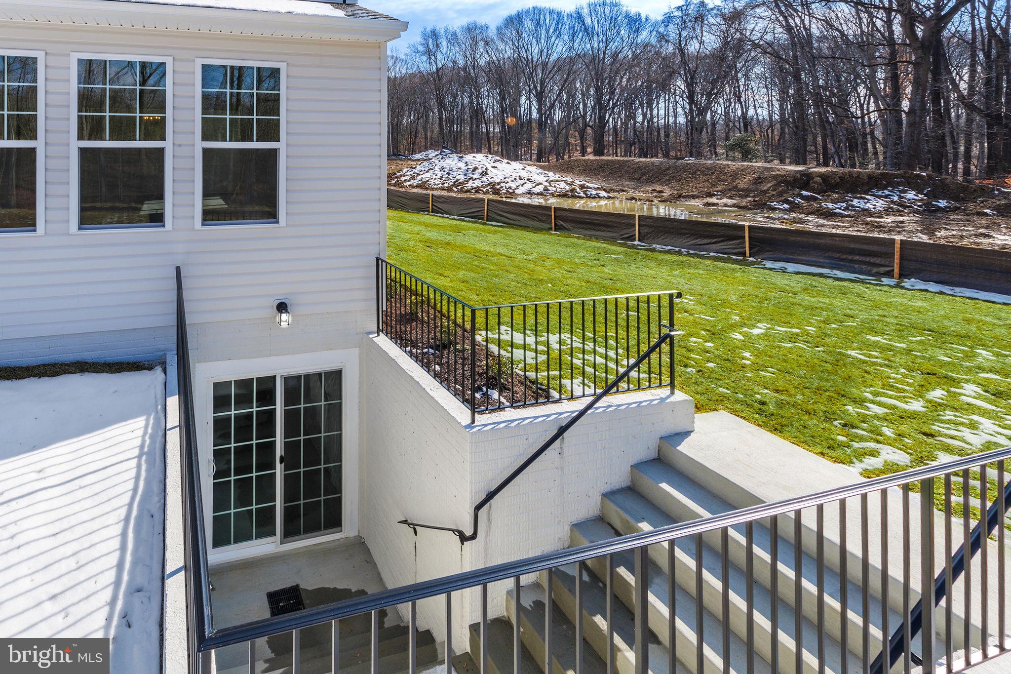 15719 Henrietta Drive Accokeek, MD 20607 - Photo 6 of 48 a view of a swimming pool with a lounge chairs