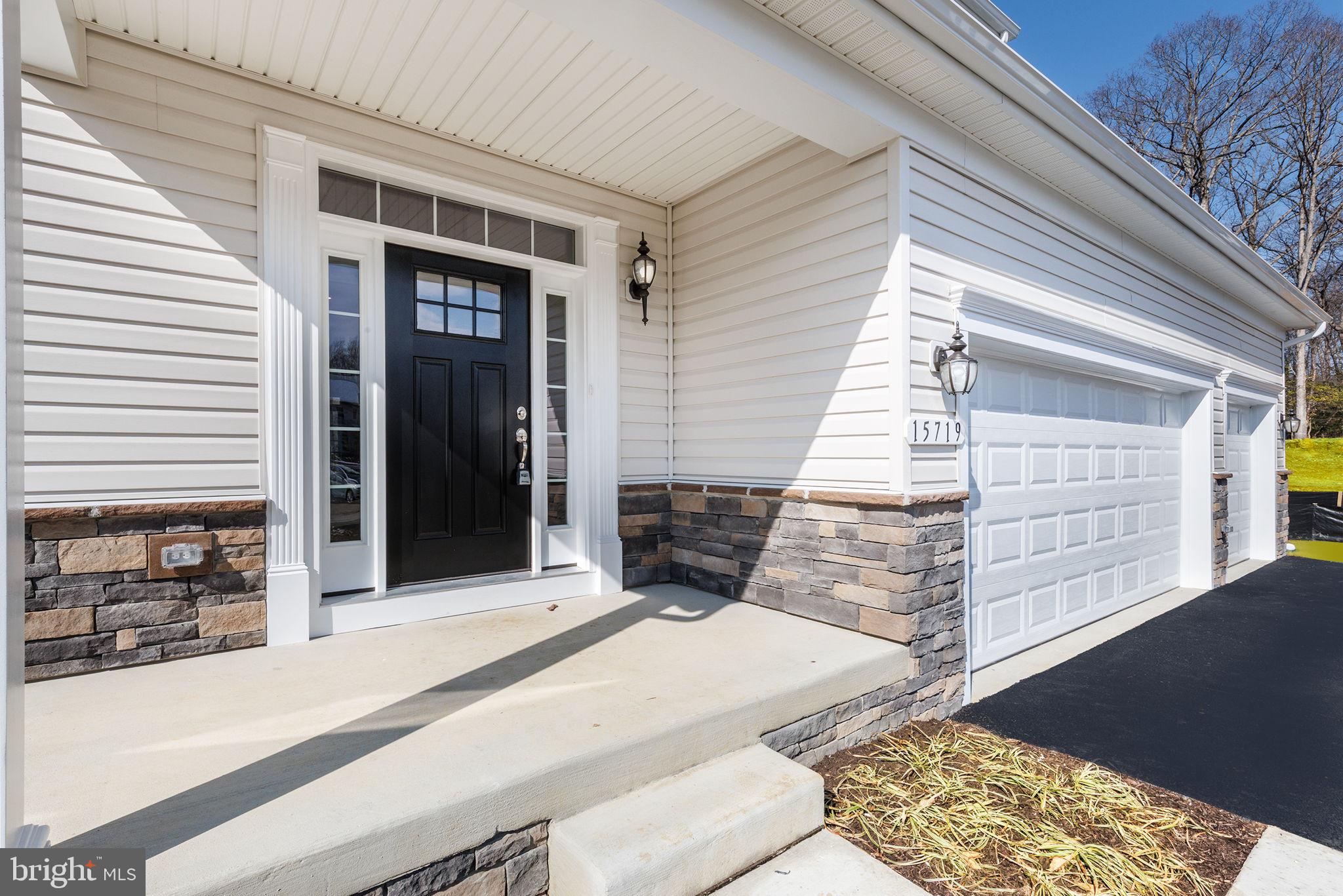 15719 Henrietta Drive Accokeek, MD 20607 - Photo 9 of 48 a outdoor space of a house with garage