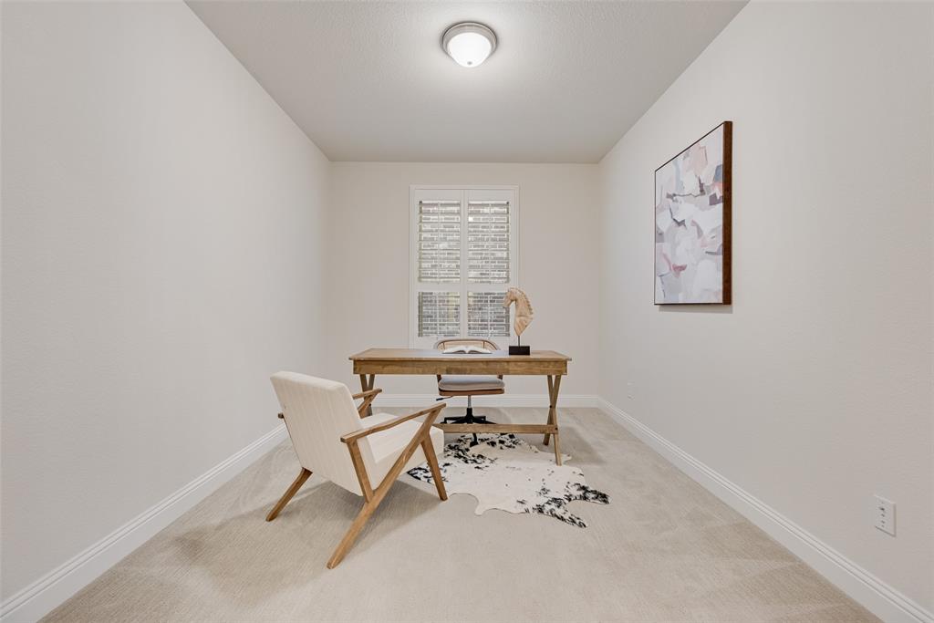 1508 Cherry Blossom Lane Prosper, TX 75078 - Photo 15 of 40 a view of a workspace with furniture and a window