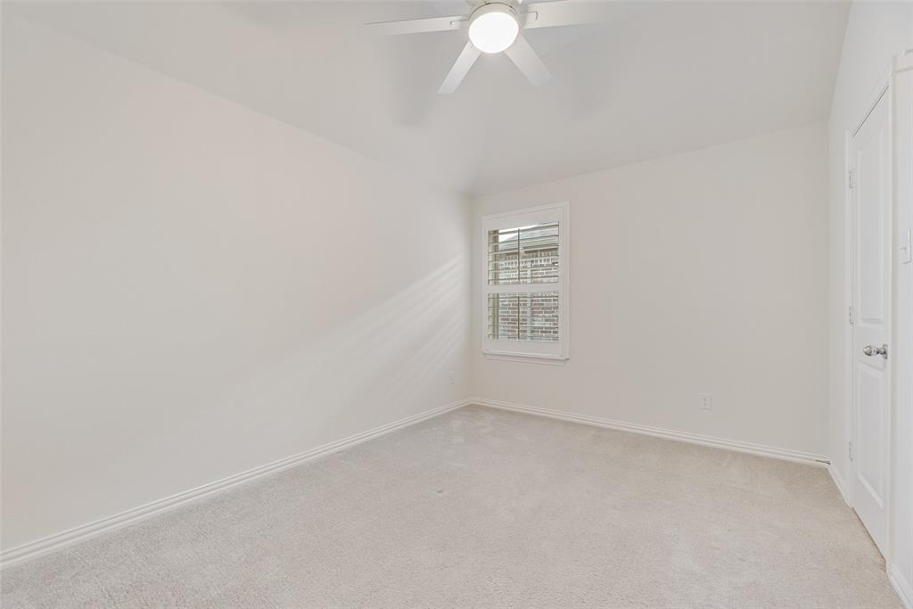 1508 Cherry Blossom Lane Prosper, TX 75078 - Photo 25 of 40 an empty room with a window