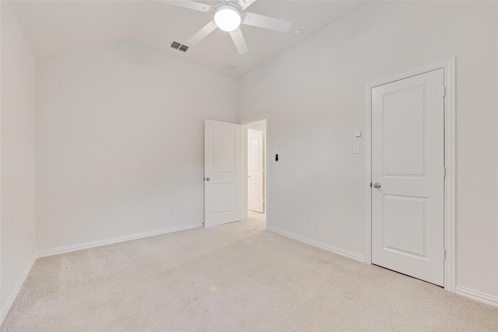 1508 Cherry Blossom Lane Prosper, TX 75078 - Photo 28 of 40 a view of an empty room