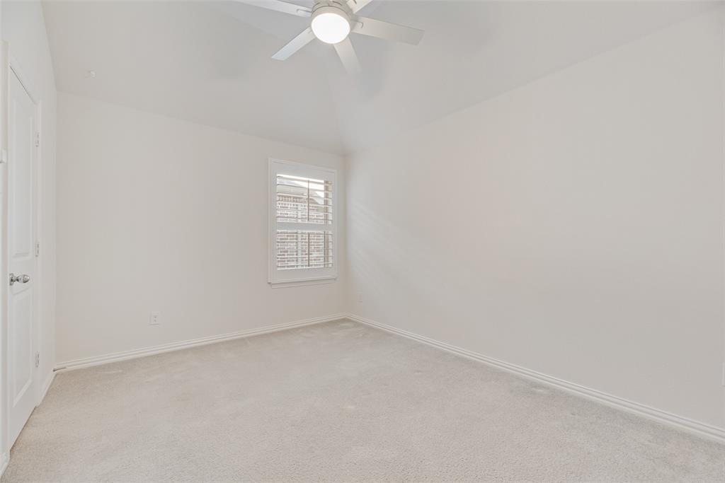 1508 Cherry Blossom Lane Prosper, TX 75078 - Photo 29 of 40 an empty room with a fan & a window