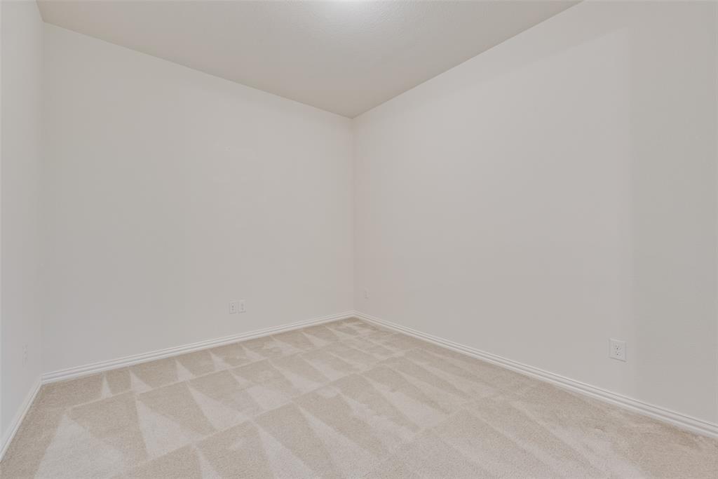 1508 Cherry Blossom Lane Prosper, TX 75078 - Photo 35 of 40 a view of an empty room