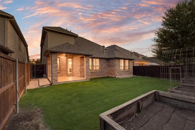 a view of a backyard with a garden