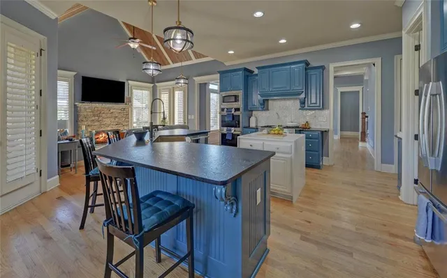 a living room with furniture fireplace and a flat screen tv