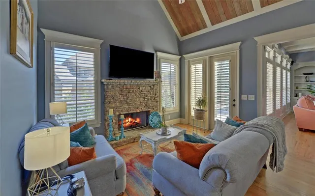 a view of an empty room with a windows