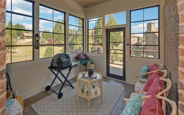 a bedroom with a bed and a table in it