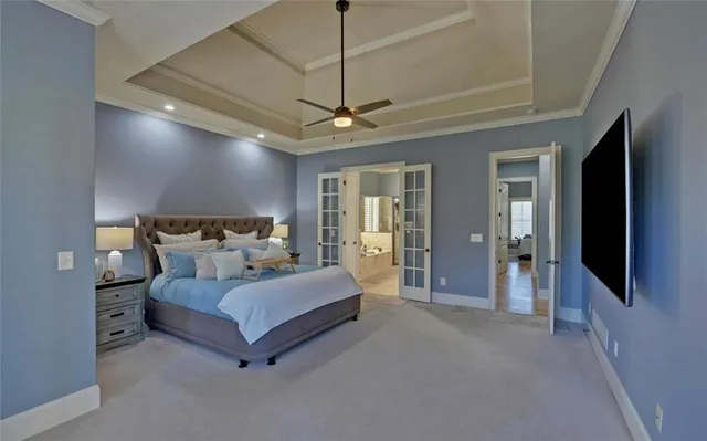 a view of walk in closet with clothes