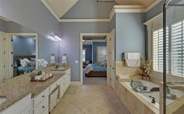 a view of a balcony with wooden floor and fence