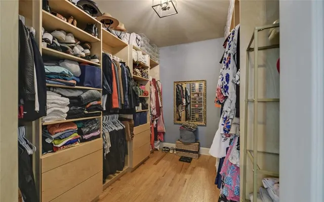 a view of a patio with couches chairs and potted plants