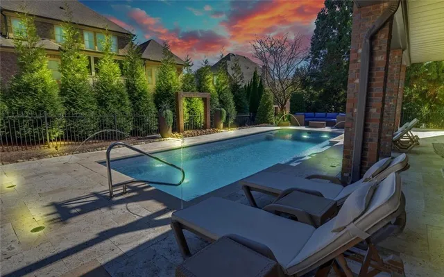 a view of a street with a building in the background