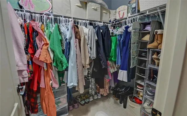 a bathroom with a shower and a sink