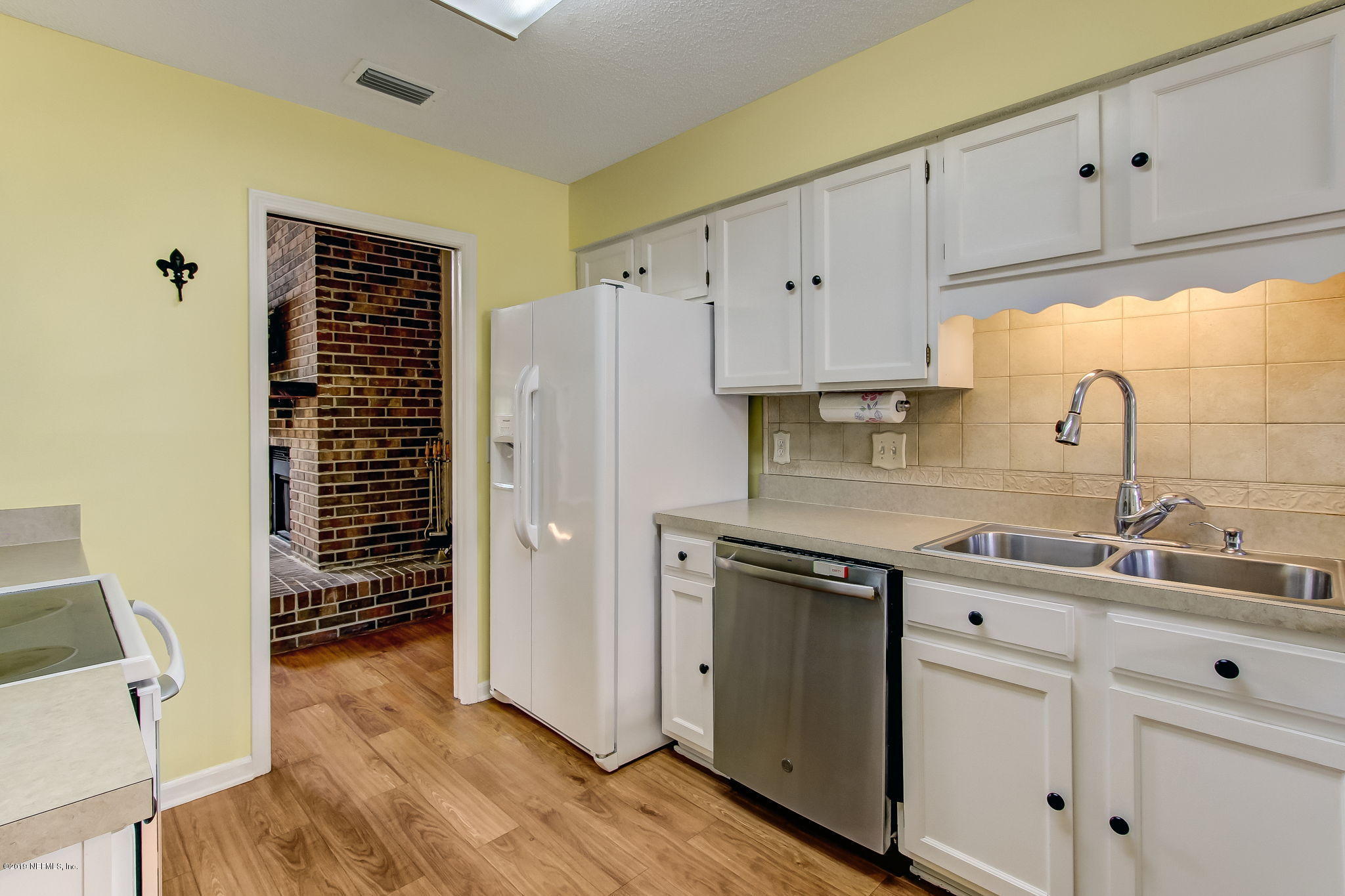 11060 Reading Road Jacksonville, FL 32257 - Photo 14 of 43 a kitchen with stainless steel appliances a stove a sink and a refrigerator