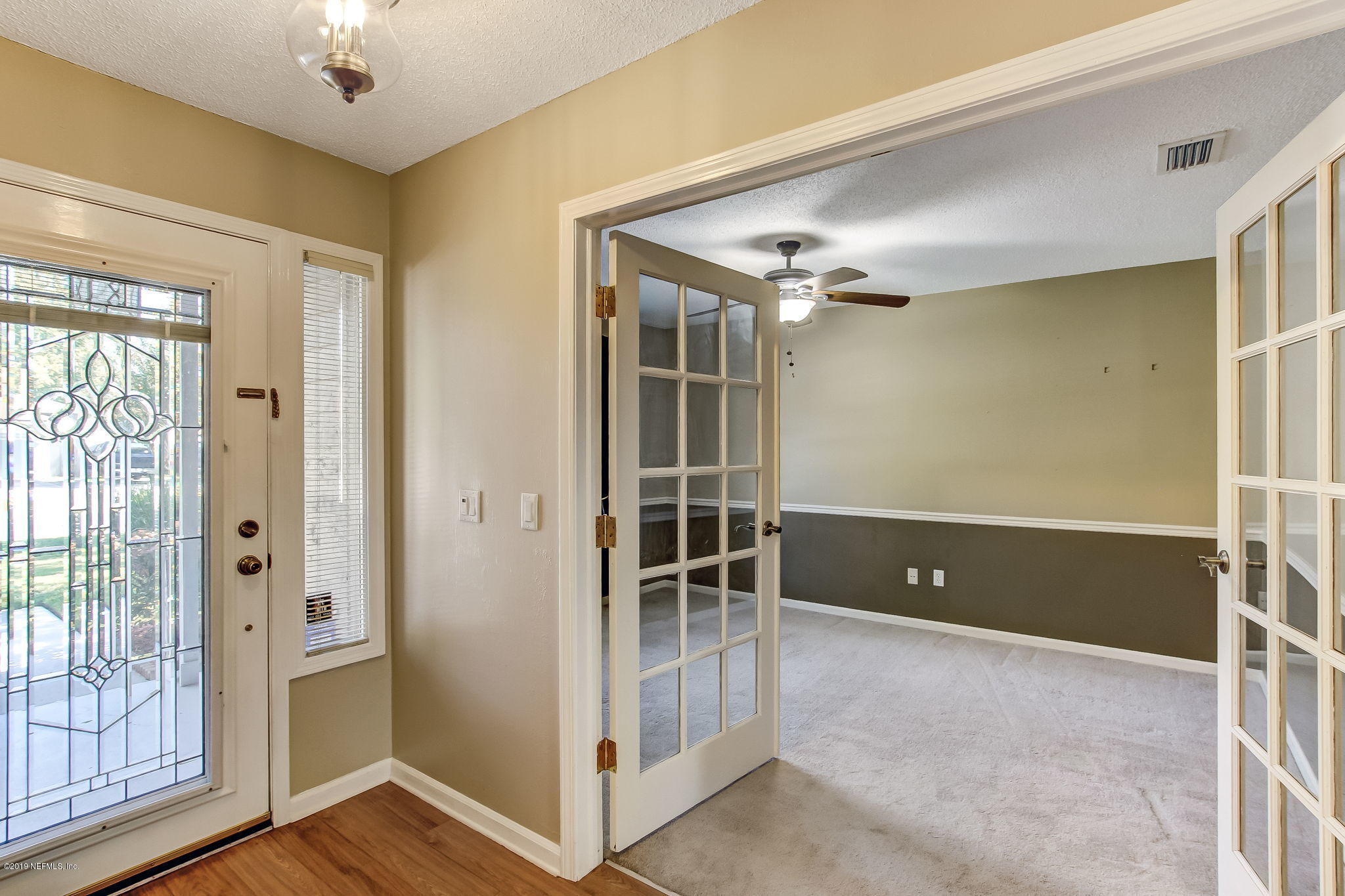 11060 Reading Road Jacksonville, FL 32257 - Photo 18 of 43 a view of room with window and hardwood floor