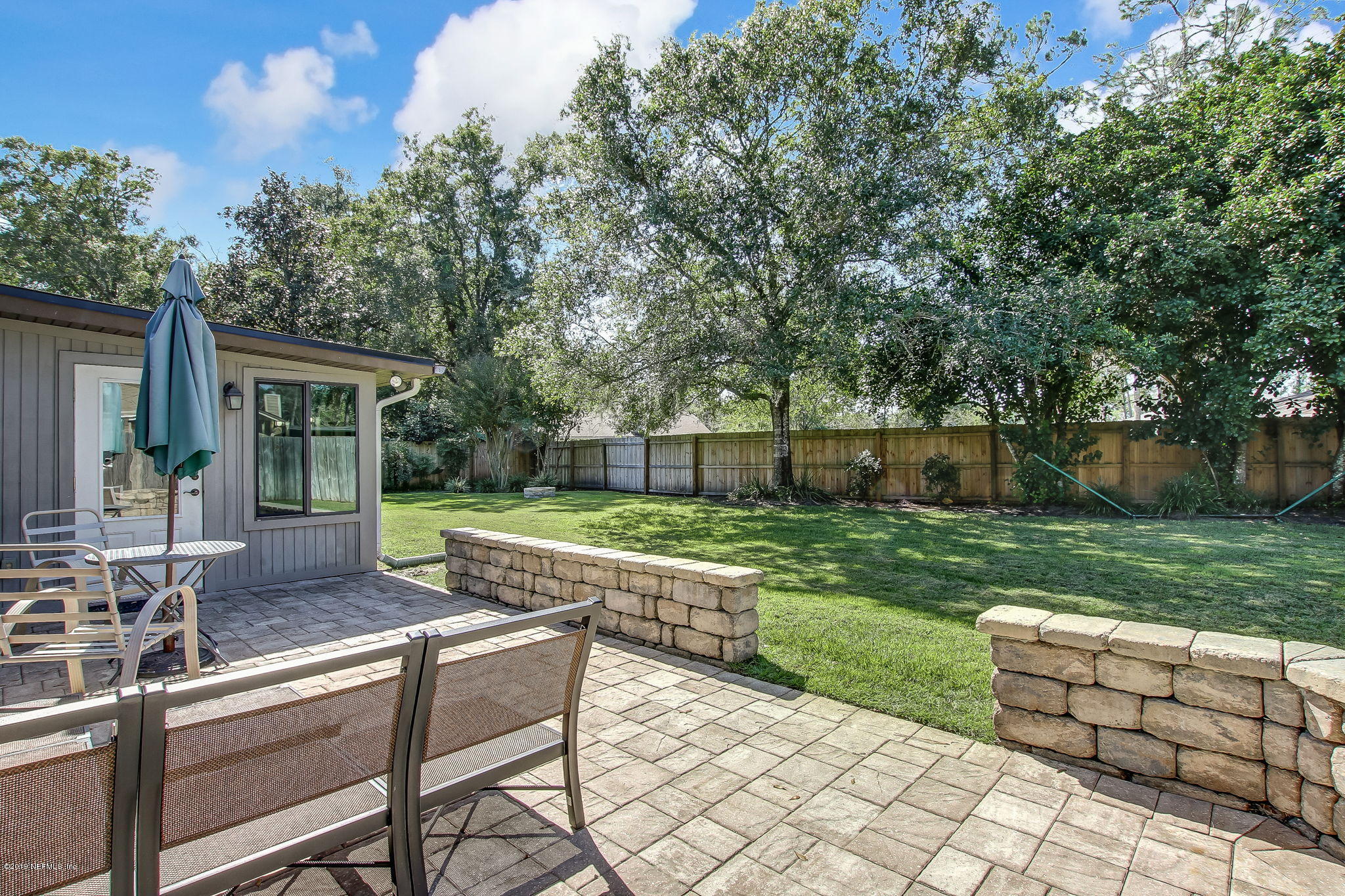 11060 Reading Road Jacksonville, FL 32257 - Photo 36 of 43 a view of house with backyard outdoor seating and green space
